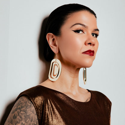 large ovoid earring gold metal crescent cutout