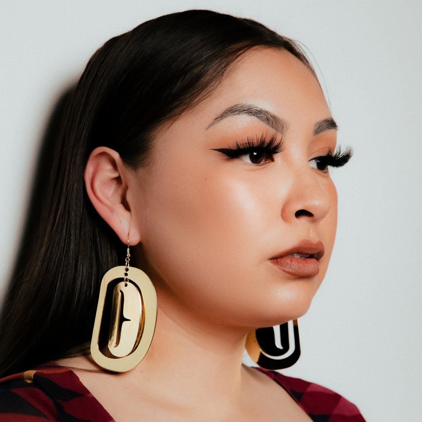 large ovoid earring gold metal trigon cutout model