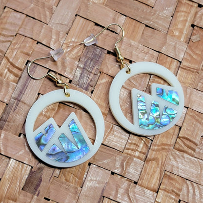 ivory acrylic earring with mountain cut out and abalone inlay from copper canoe woman
