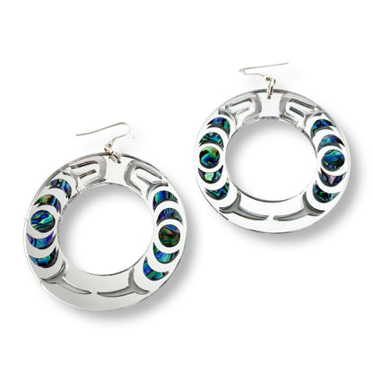 A pair of silver mirror acrylic "Nala Hoop" earrings from Copper Canoe Woman.