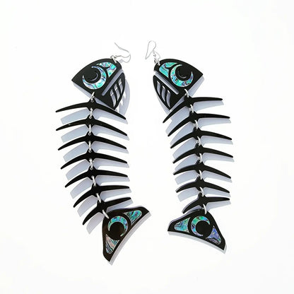 Black acrylic large salmon ghost earrings from Copper Canoe Woman on a white background.