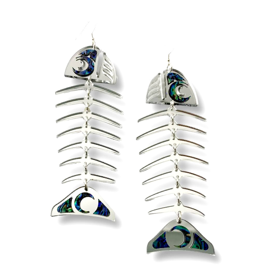 Copper Canoe Woman large salmon ghost earring in silver mirror acrylic on a white background.