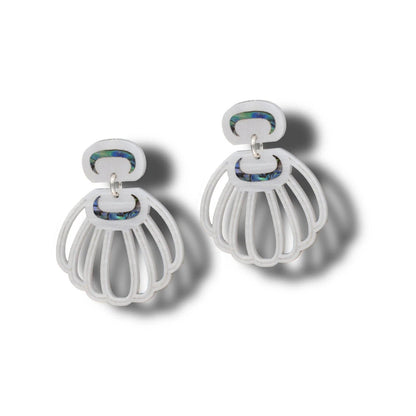 A pair of pearl acrylic Shell Woman earrings from Copper Canoe Woman.
